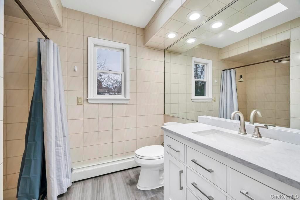 Bathroom, Glass Shower, Interior, Recessed Lighting, Wood Texture Flooring