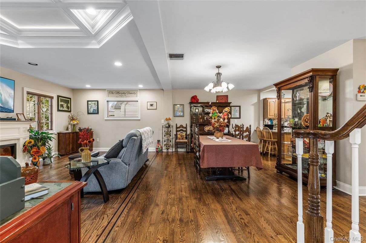 Chandelier, Dining room, Fireplace, Interior, Living room, Recessed Lighting, Wood Texture Flooring