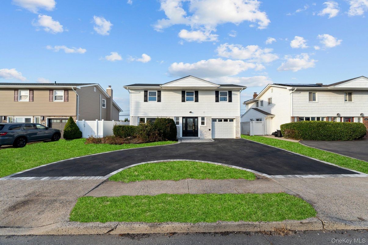 Attached, Exterior, Facade, Raised Ranch