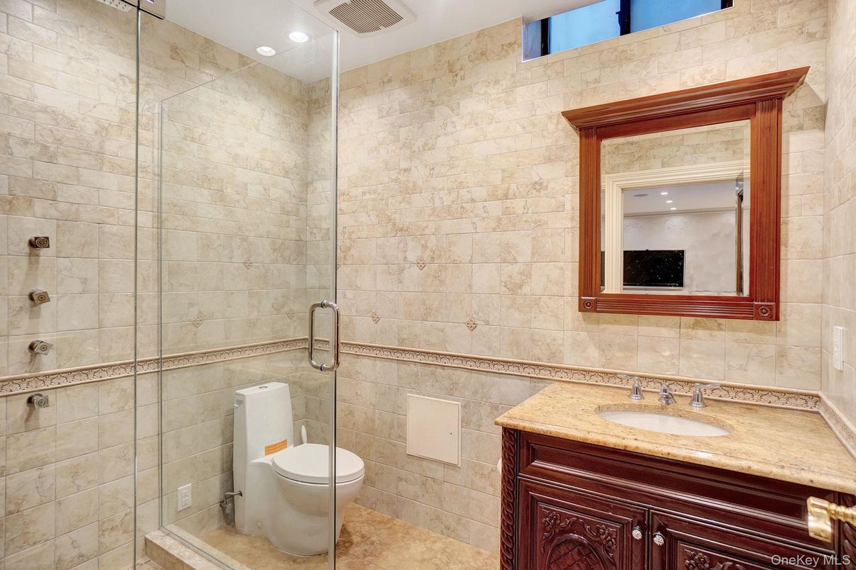 Bathroom, Glass Shower, Interior, Recessed Lighting, Stone Walls