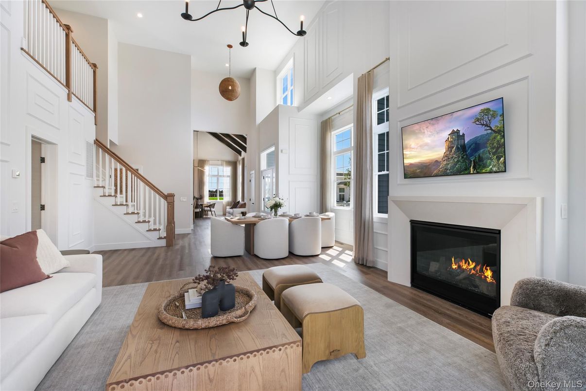 Dining room, Fireplace, Interior, Living room, Pendant Lights, Recessed Lighting, Wood Texture Flooring