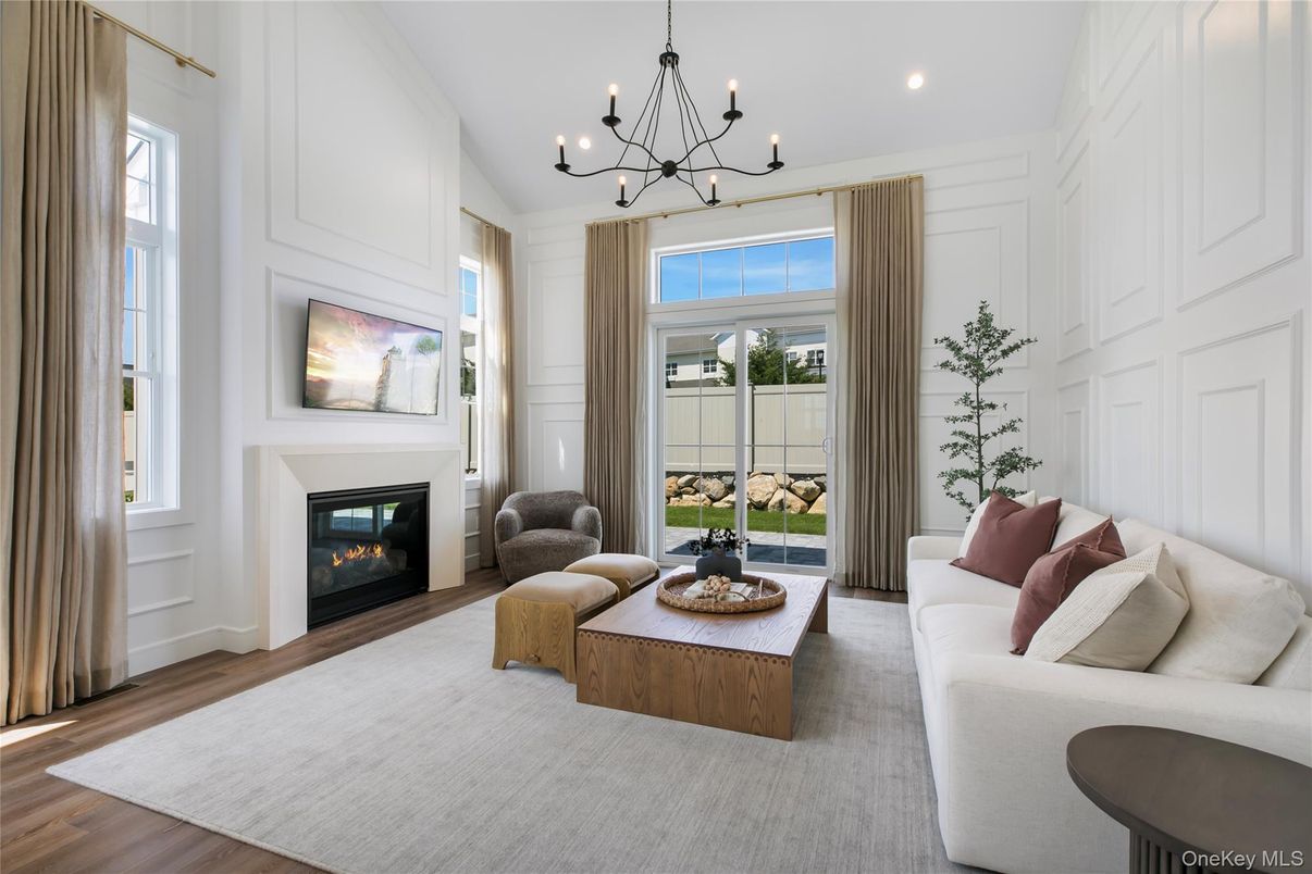 Chandelier, Fireplace, Interior, Living room, Recessed Lighting, Wood Texture Flooring