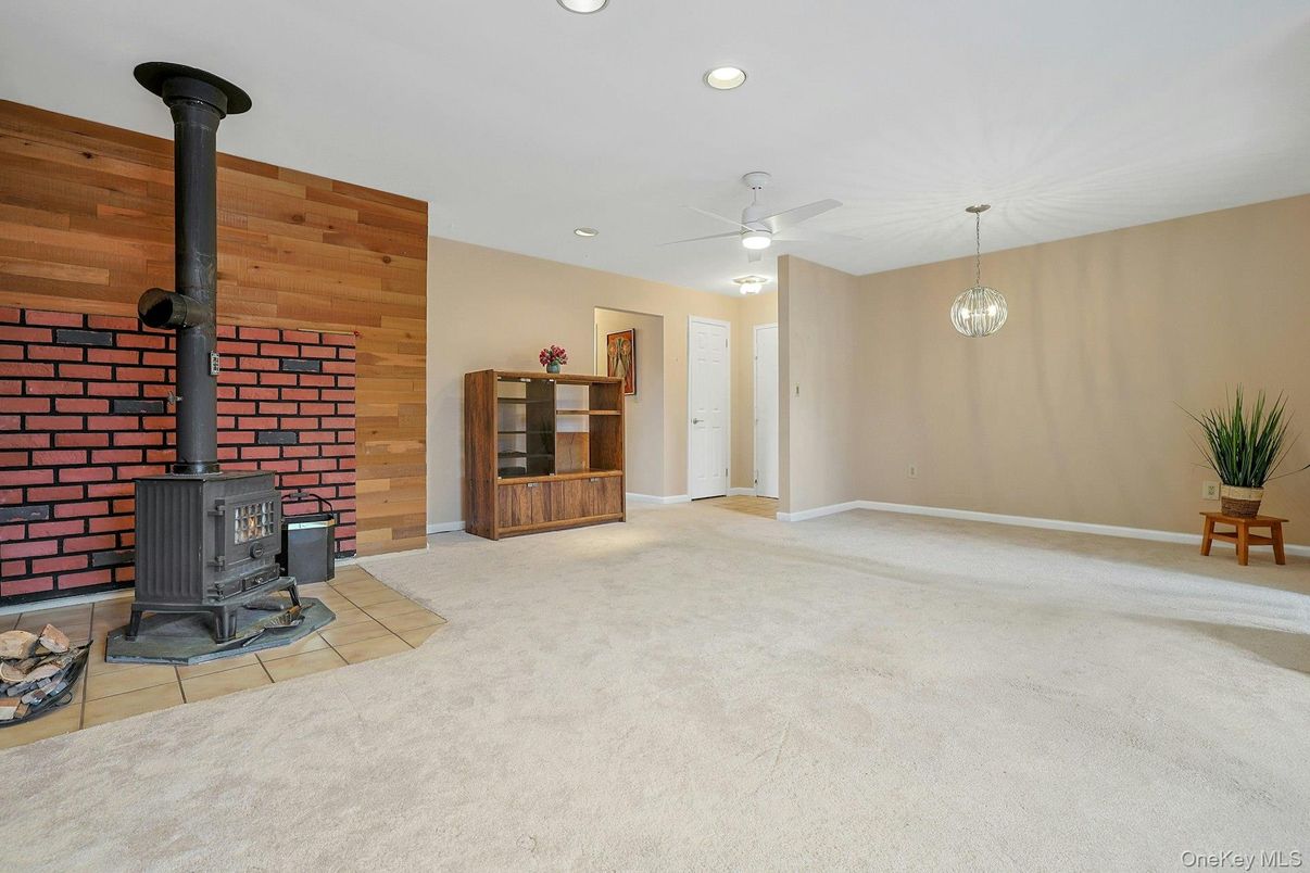 Empty room, Fireplace, Interior, Pendant Lights, Recessed Lighting, Wooden Walls