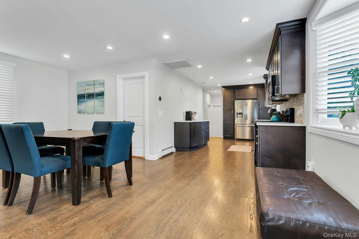 Dining room, Interior, Kitchen, Recessed Lighting, Stainless Steel Appliances, Wood Texture Flooring