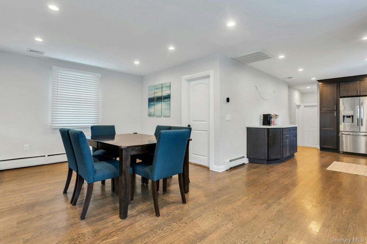 Dining room, Interior, Kitchen, Recessed Lighting, Stainless Steel Appliances, Wood Texture Flooring