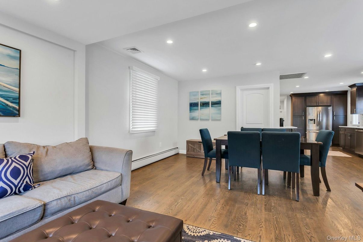 Dining room, Interior, Kitchen, Living room, Recessed Lighting, Stainless Steel Appliances, Wood Texture Flooring