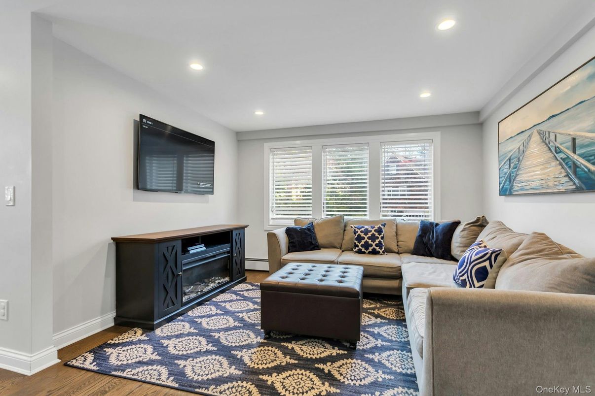 Fireplace, Interior, Living room, Recessed Lighting, Wood Texture Flooring