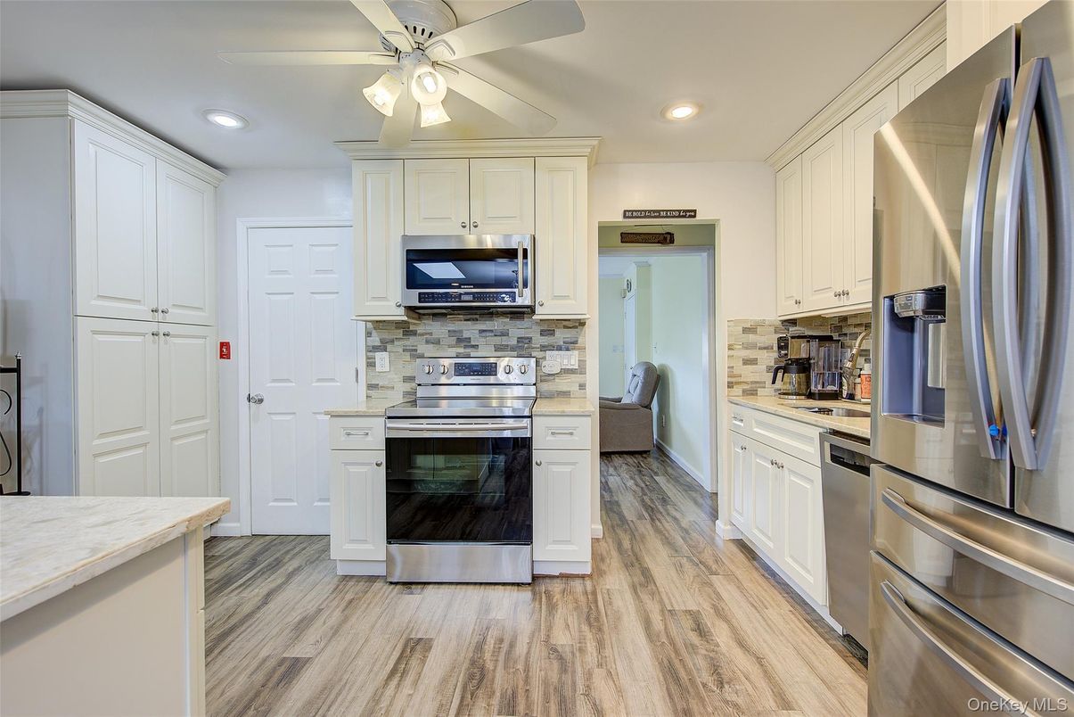 Interior, Kitchen, Recessed Lighting, Stainless Steel Appliances, Wood Texture Flooring