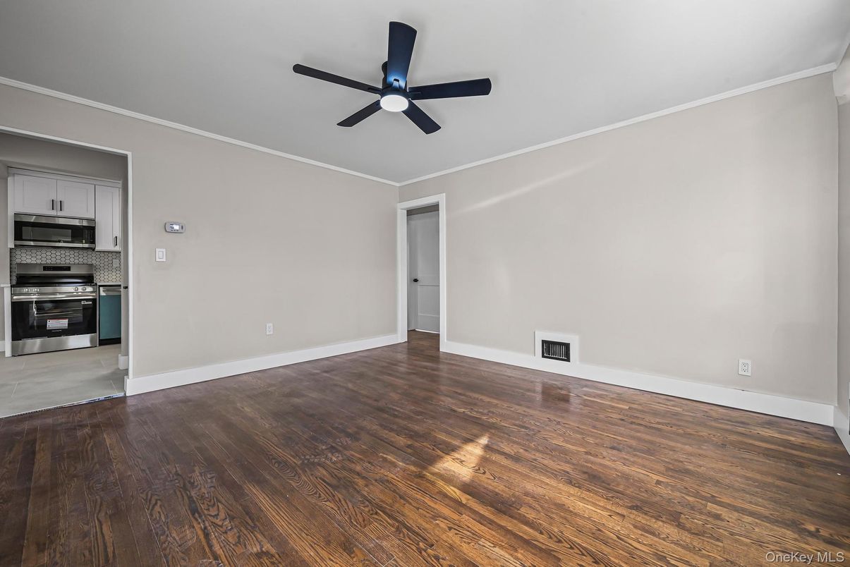 Empty room, Interior, Kitchen, Stainless Steel Appliances, Wood Texture Flooring