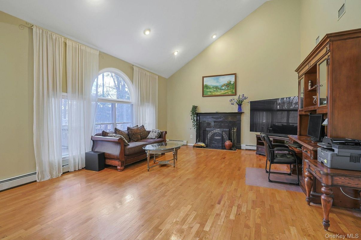 Fireplace, Home Office, Interior, Recessed Lighting, Wood Texture Flooring