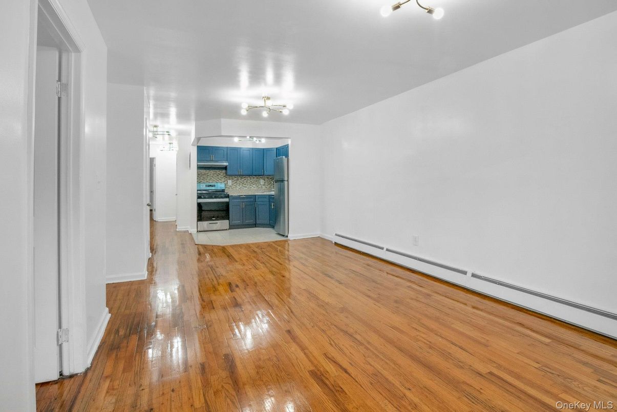 Empty room, Interior, Kitchen, Stainless Steel Appliances, Wood Texture Flooring