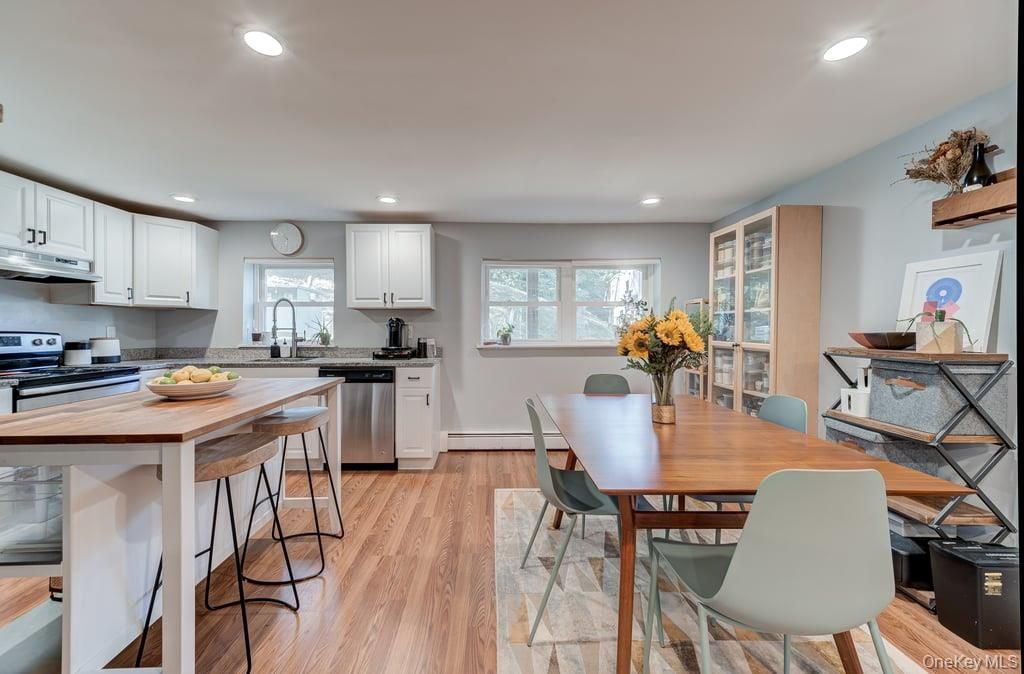 Dining room, Interior, Kitchen, Recessed Lighting, Stainless Steel Appliances, Wood Texture Flooring
