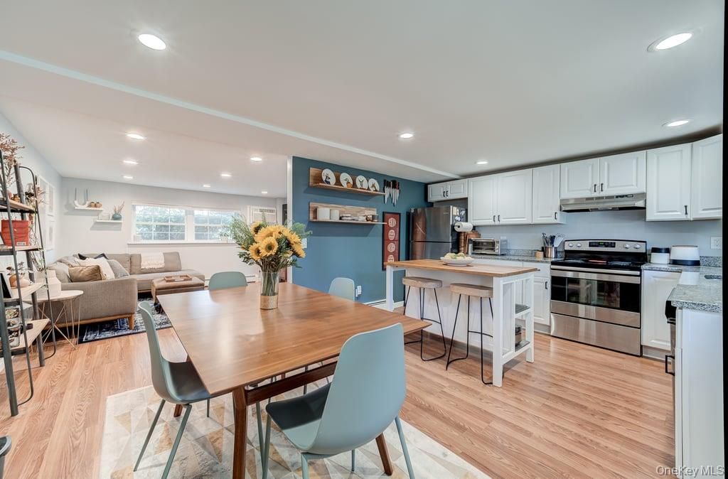 Dining room, Interior, Kitchen, Living room, Recessed Lighting, Stainless Steel Appliances, Wood Texture Flooring