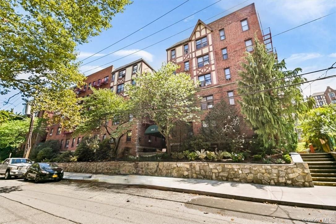 Exterior, Facade, Brick Facade, Condo Building