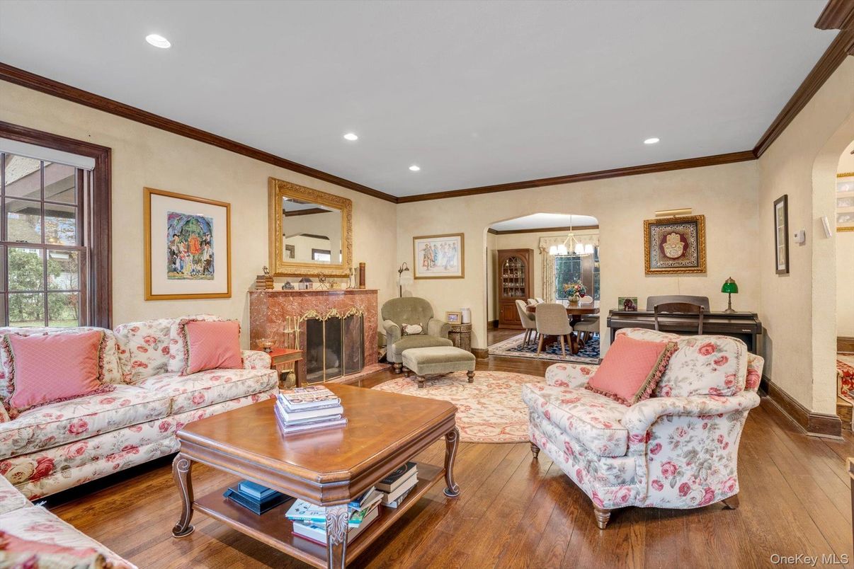Dining room, Fireplace, Interior, Living room, Pendant Lights, Recessed Lighting, Wood Texture Flooring
