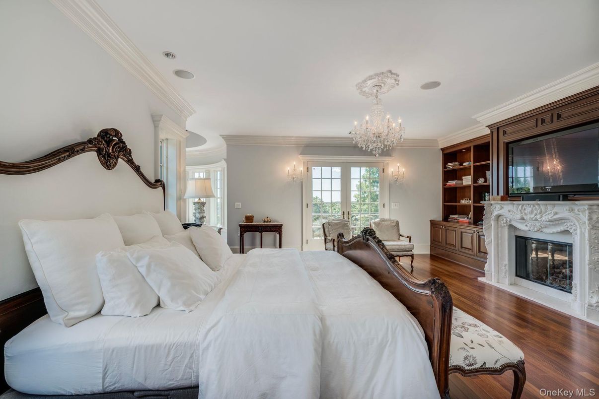 Bedroom, Chandelier, Fireplace, Interior, Wood Texture Flooring