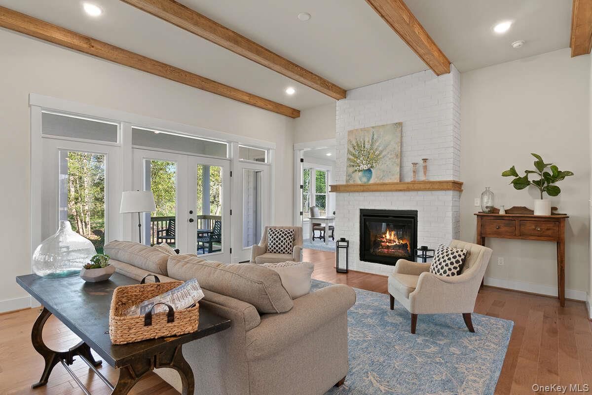 Fireplace, Interior, Living room, Recessed Lighting, Stone Walls, Wooden Beams, Wood Texture Flooring