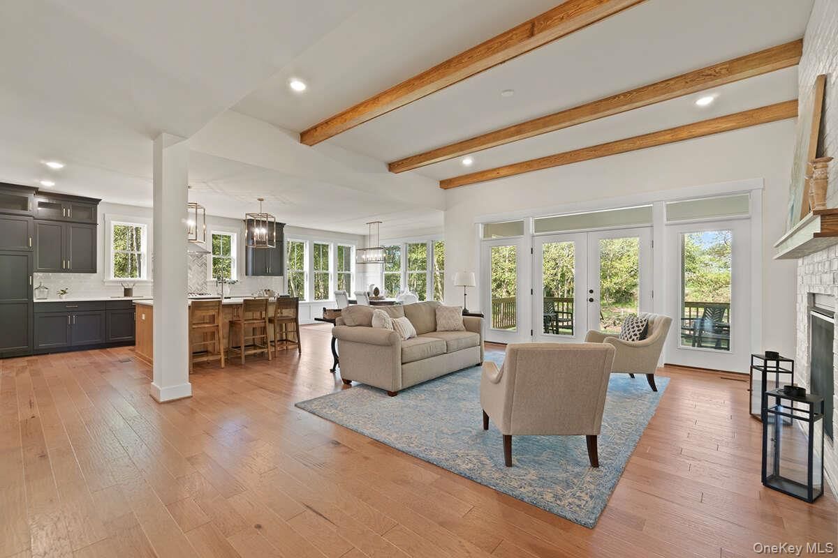 Dining room, Fireplace, Interior, Kitchen, Living room, Pendant Lights, Recessed Lighting, Wooden Beams, Wood Texture Flooring