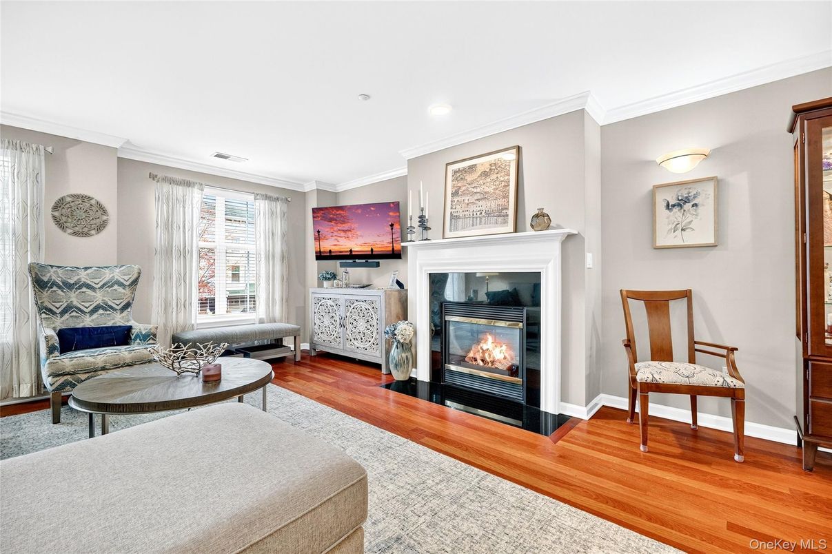 Fireplace, Interior, Living room, Recessed Lighting, Wood Texture Flooring