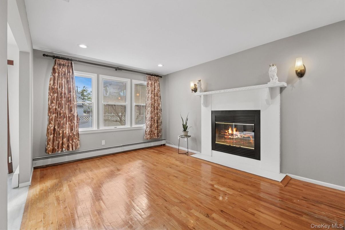 Empty room, Fireplace, Interior, Recessed Lighting, Wood Texture Flooring