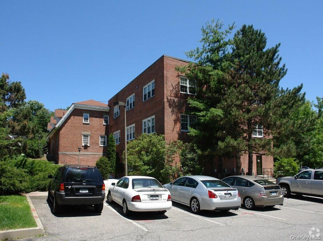 Exterior, Facade, Brick Facade, Condo Building