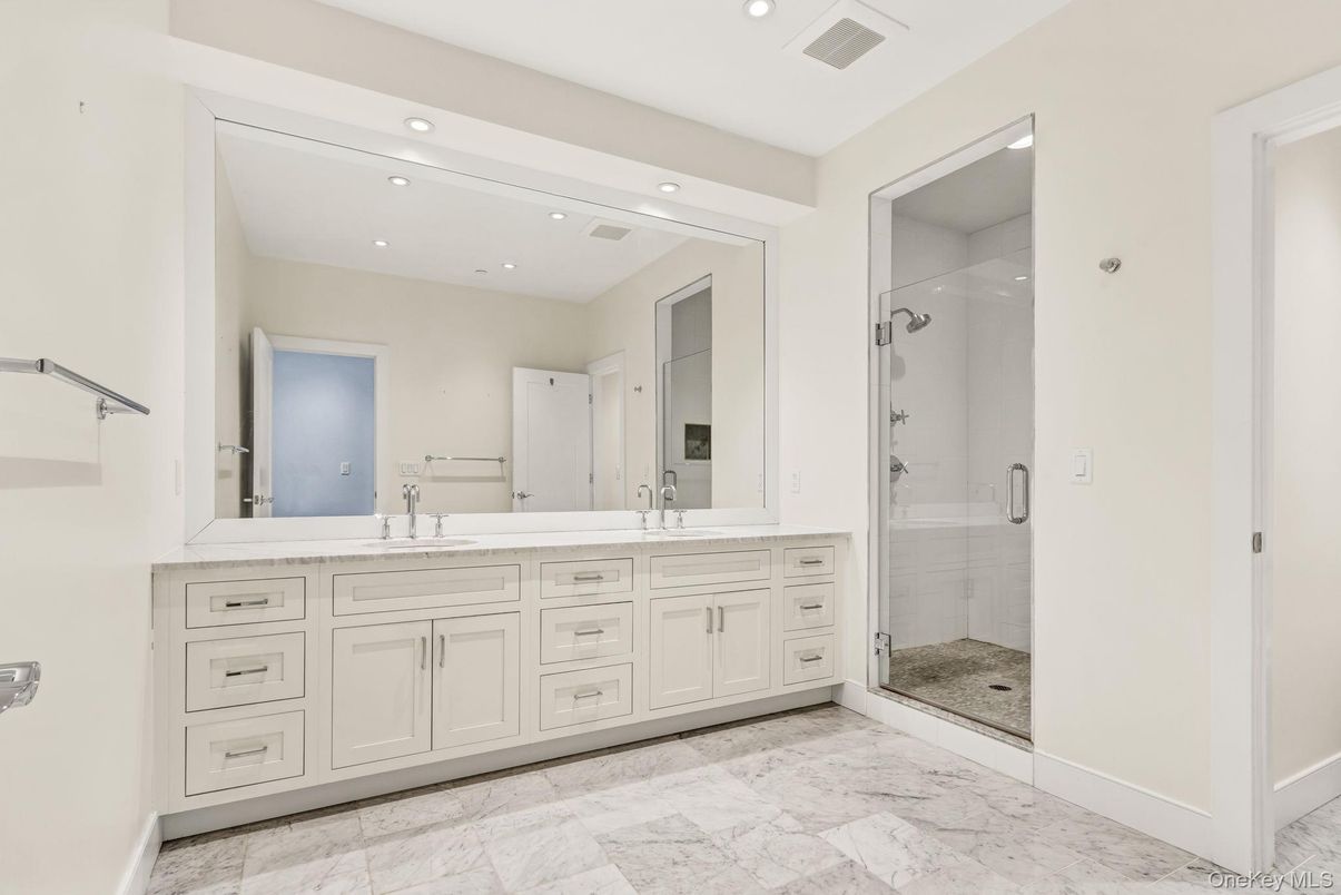 Bathroom, Dual Sink Vanities, Glass Shower, Interior, Marble, Recessed Lighting