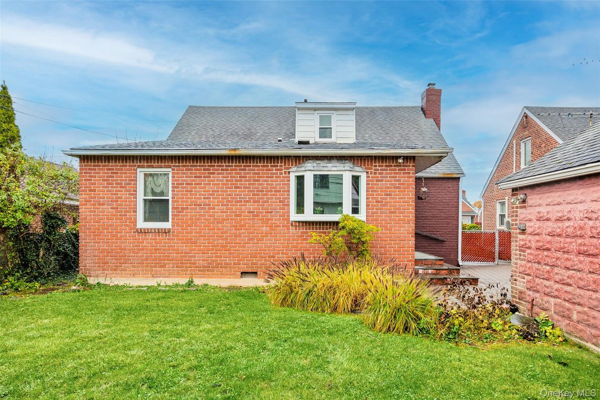 Exterior, Facade, Brick Facade, Cape Cod