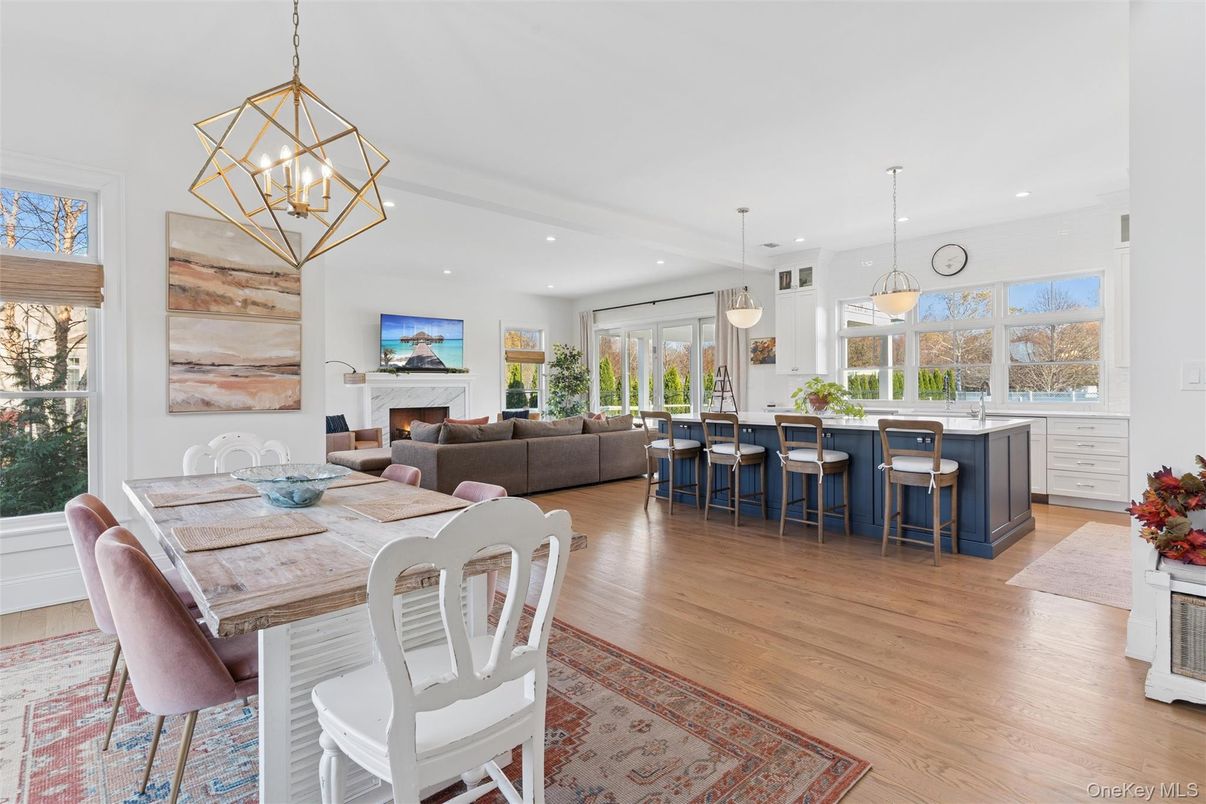Dining room, Fireplace, Interior, Living room, Pendant Lights, Recessed Lighting, Wood Texture Flooring