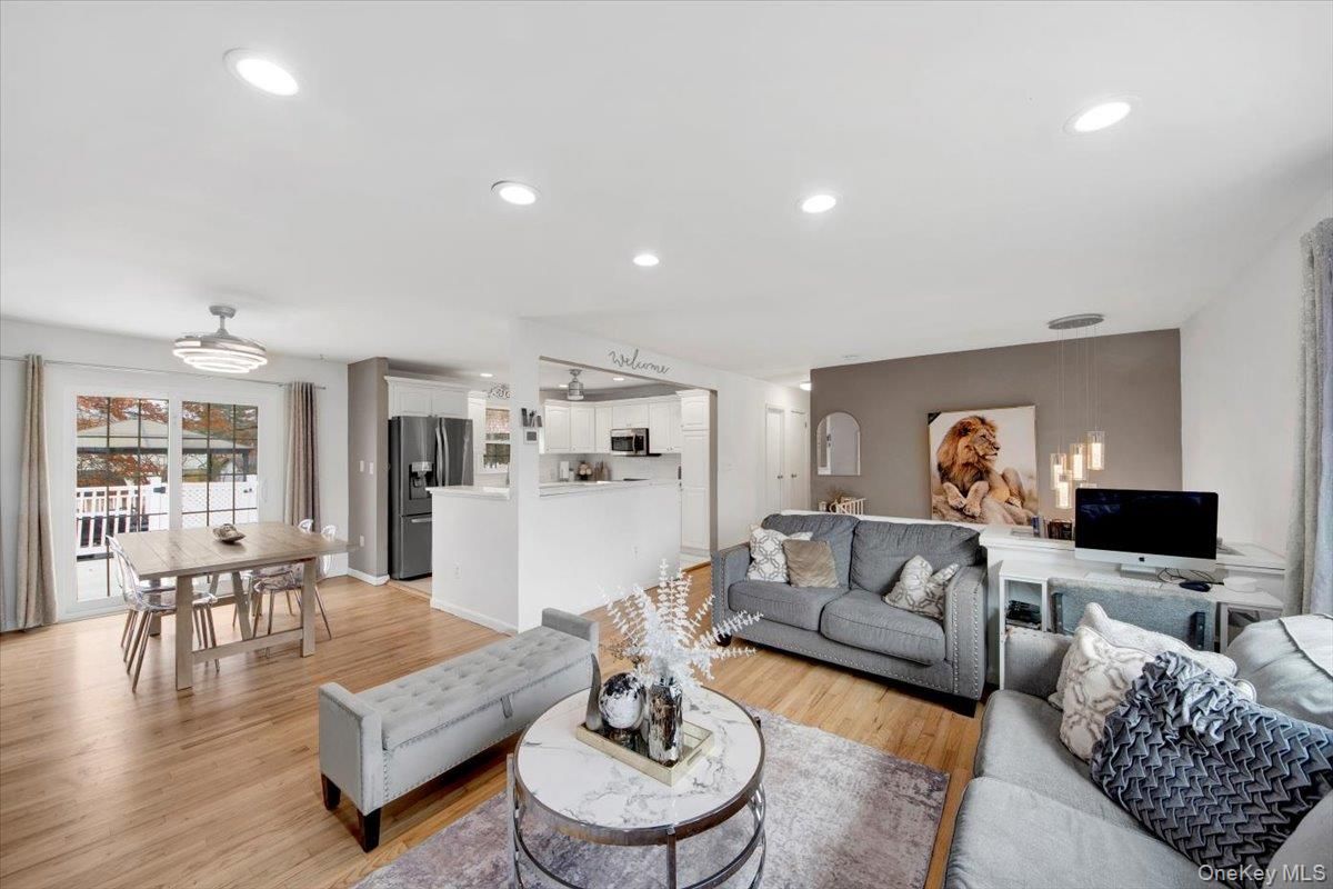 Dining room, Interior, Kitchen, Living room, Pendant Lights, Recessed Lighting, Stainless Steel Appliances, Wood Texture Flooring