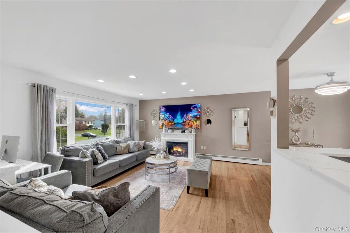 Fireplace, Interior, Living room, Recessed Lighting, Wood Texture Flooring