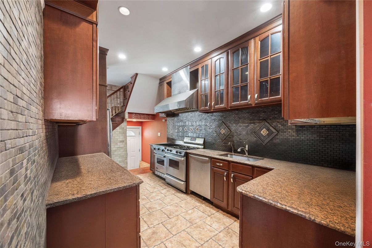 Interior, Kitchen, Recessed Lighting, Stainless Steel Appliances, Stone Walls
