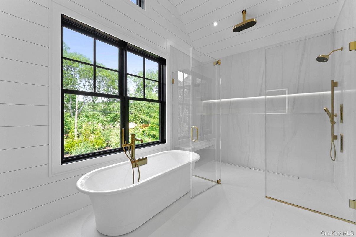 Bathroom, Free Standing Baths, Glass Shower, Interior, Marble Walls, Recessed Lighting