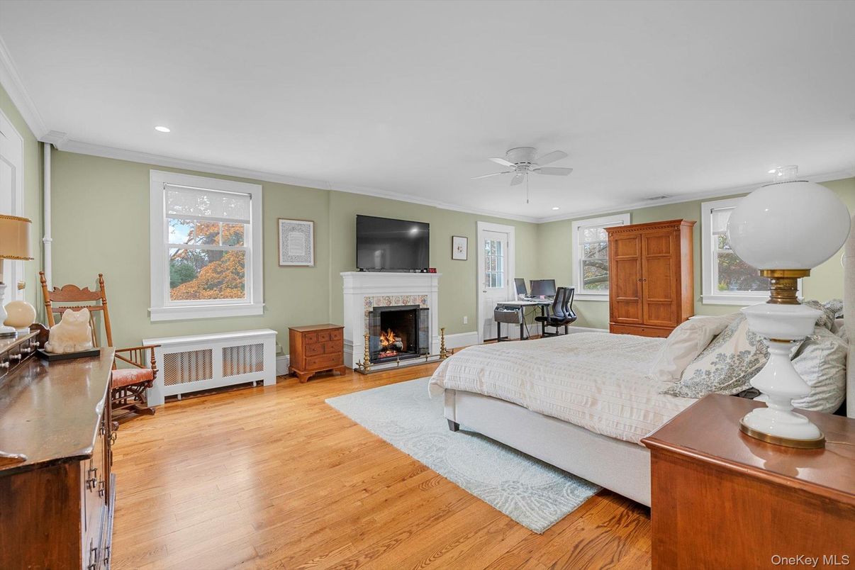 Bedroom, Fireplace, Interior, Recessed Lighting, Wood Texture Flooring
