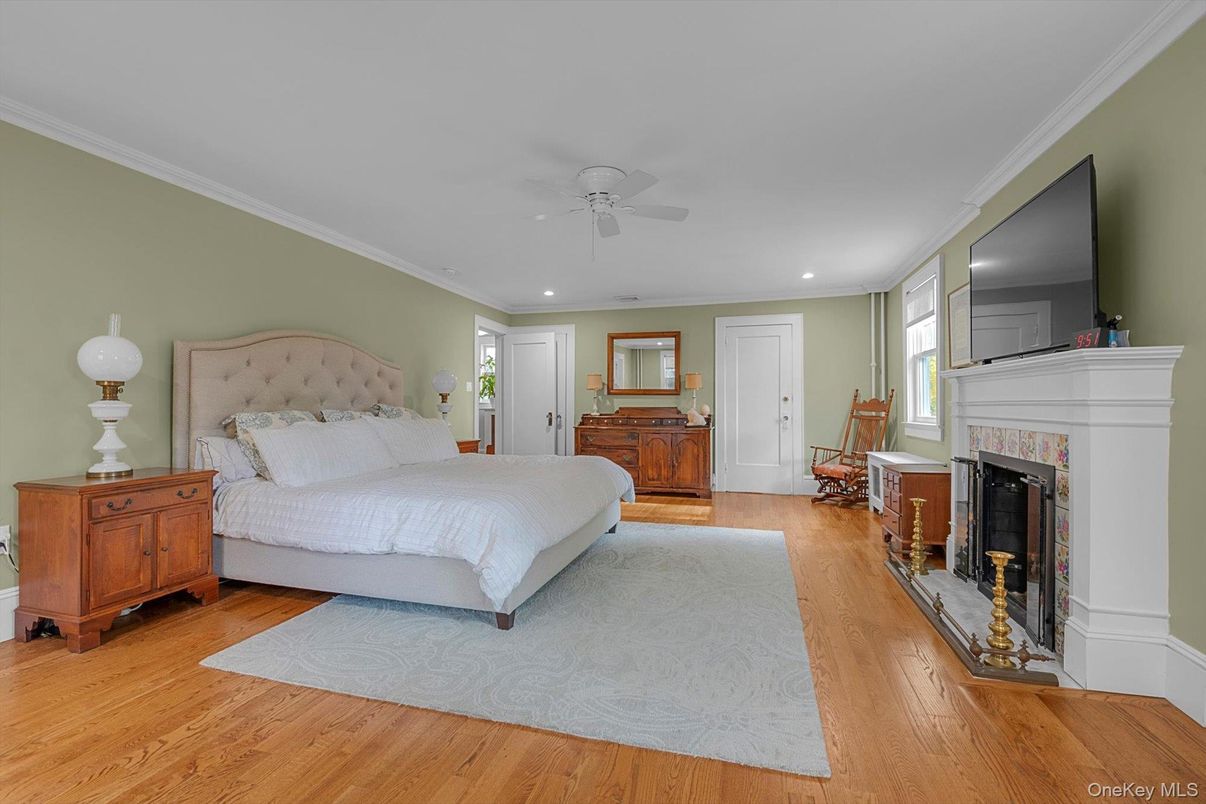 Bedroom, Fireplace, Interior, Recessed Lighting, Wood Texture Flooring