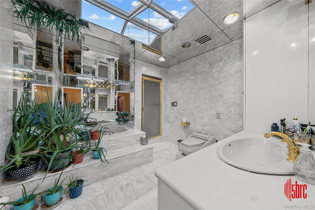 Bathroom, Dual Sink Vanities, Glass Ceilings, Interior, Marble