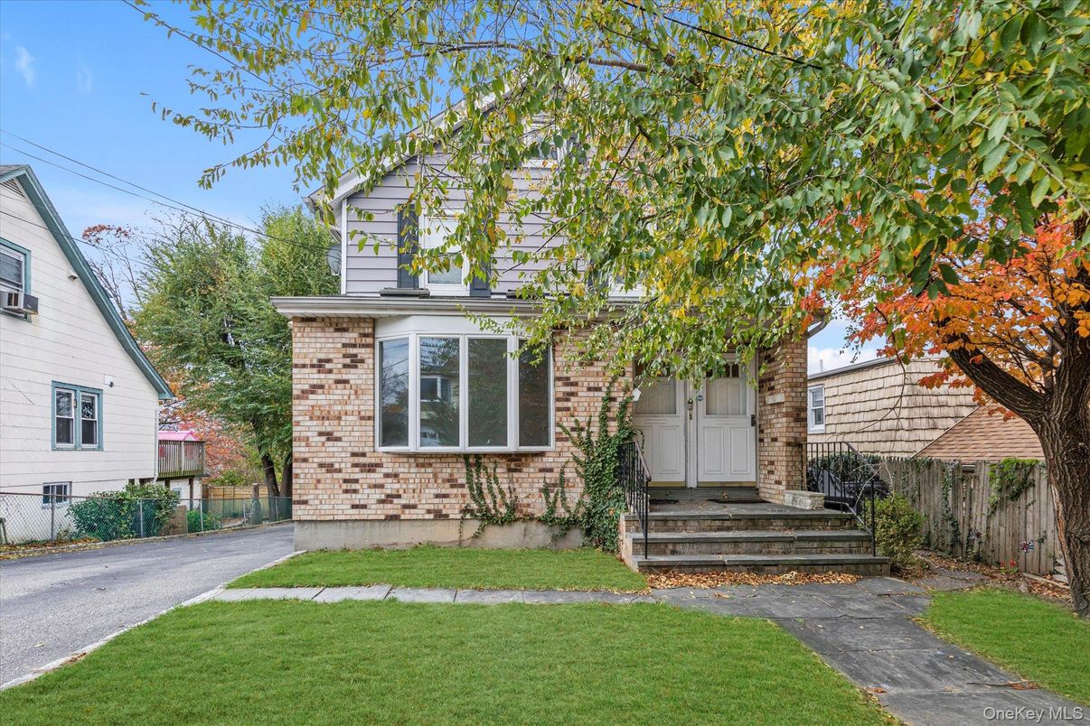 Exterior, Facade, Brick Facade, Cape Cod