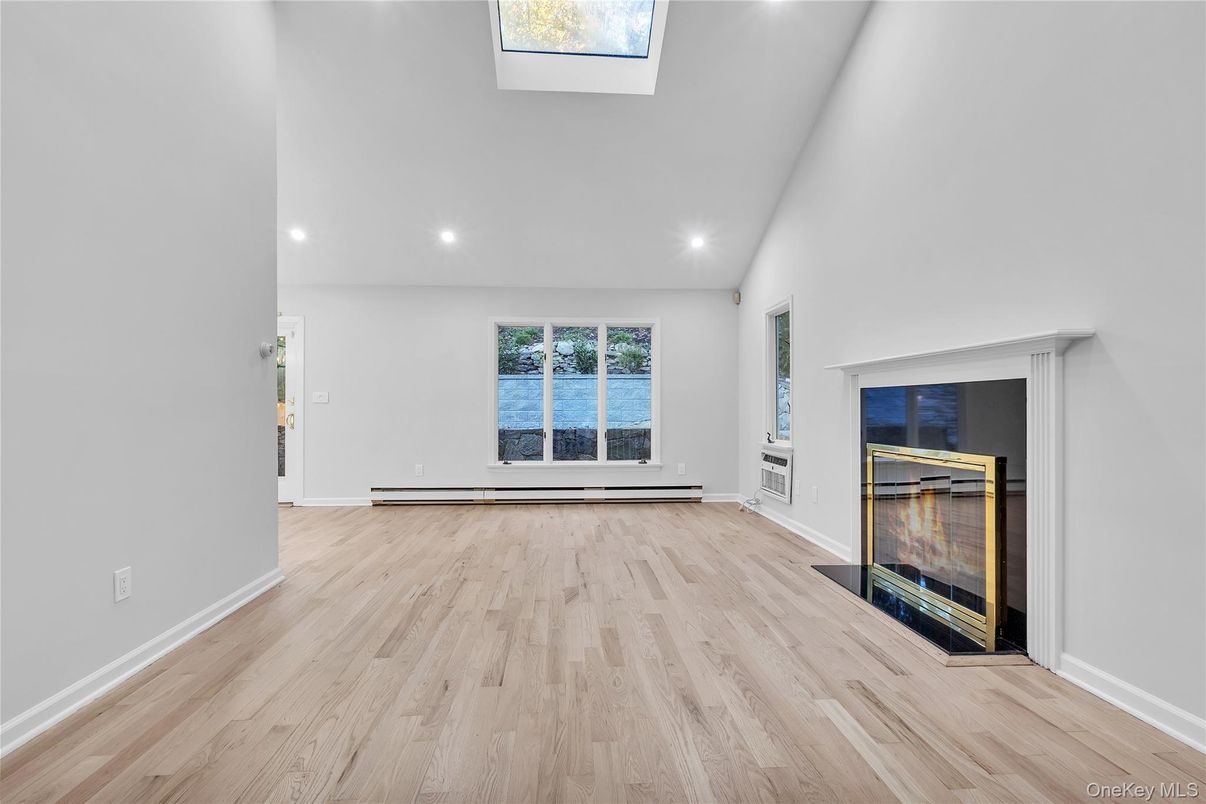 Empty room, Fireplace, Interior, Recessed Lighting, Wood Texture Flooring