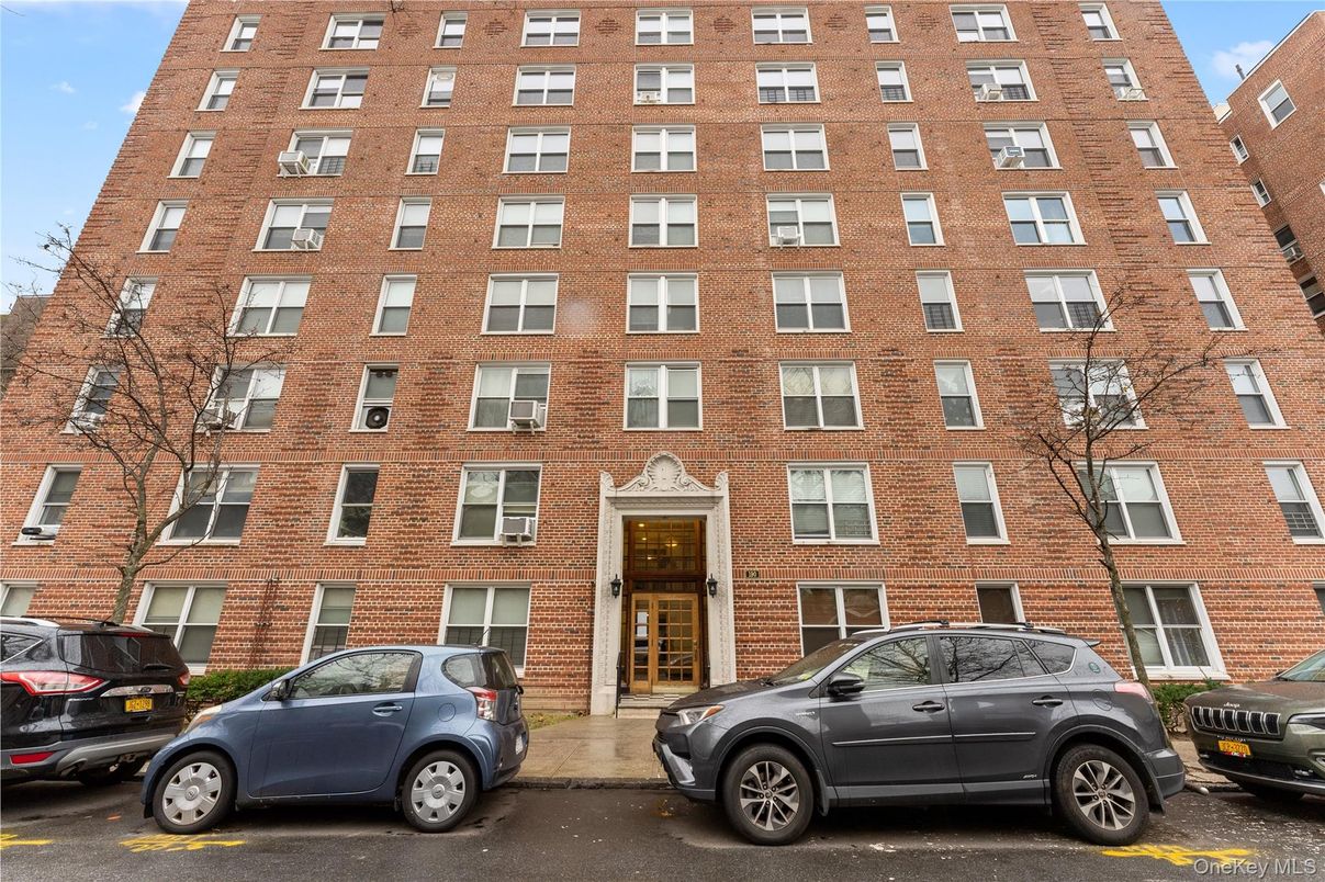 Exterior, Facade, Brick Facade, Condo Building