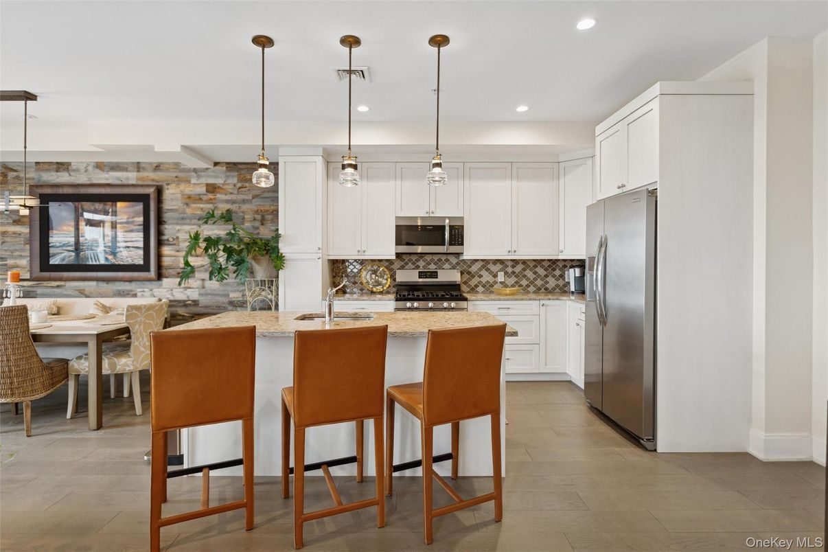 Dining room, Interior, Kitchen, Pendant Lights, Recessed Lighting, Stainless Steel Appliances, Stone Walls
