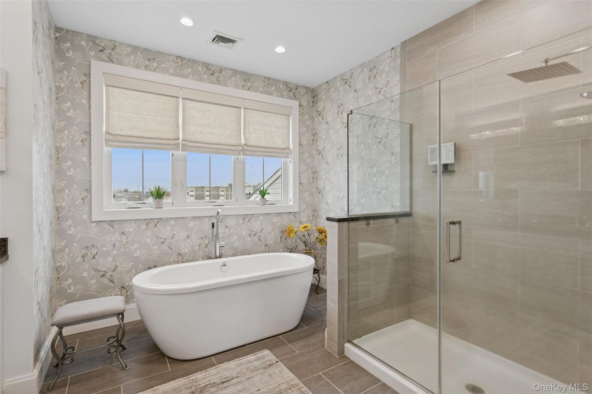 Bathroom, Free Standing Baths, Glass Shower, Interior, Recessed Lighting, Wood Texture Flooring