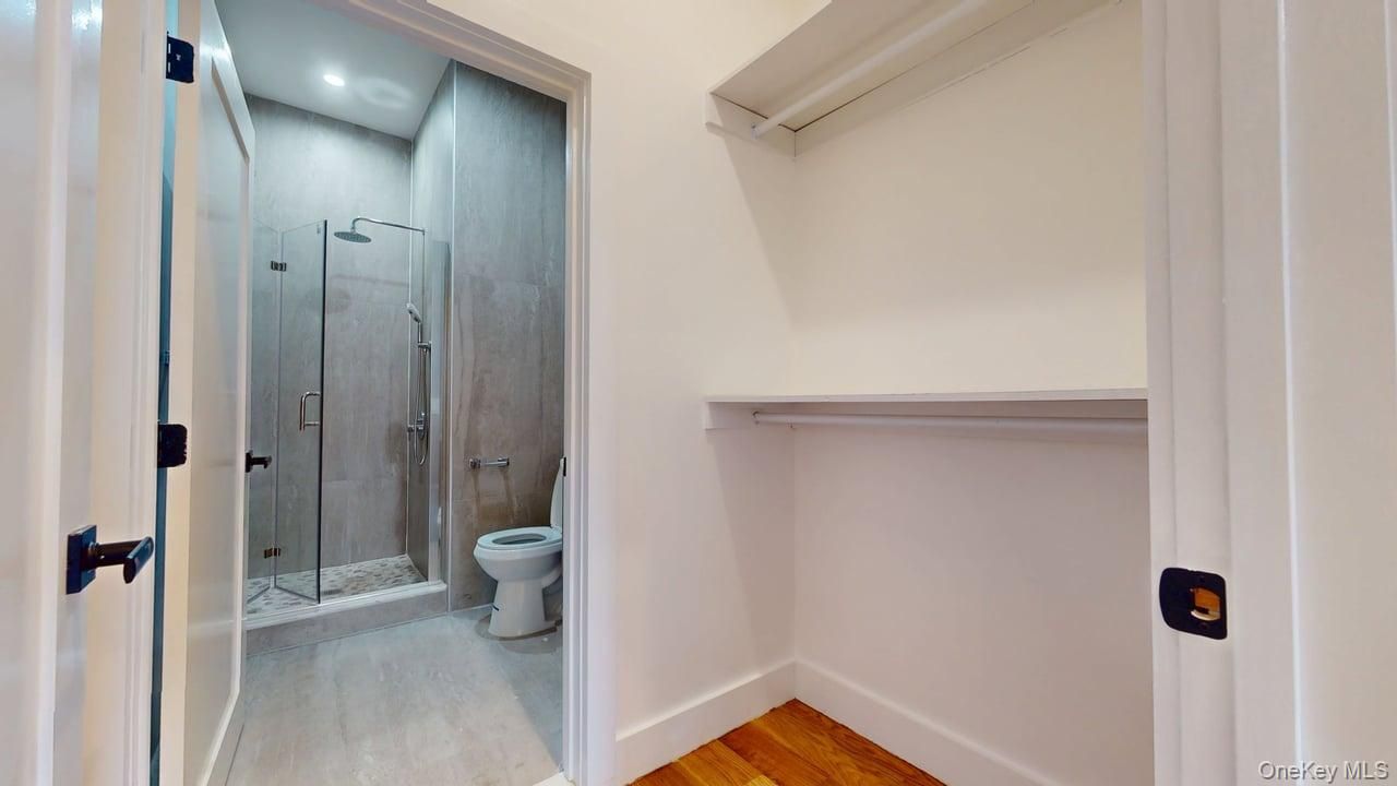 Bathroom, Glass Shower, Interior, Recessed Lighting, Wood Texture Flooring