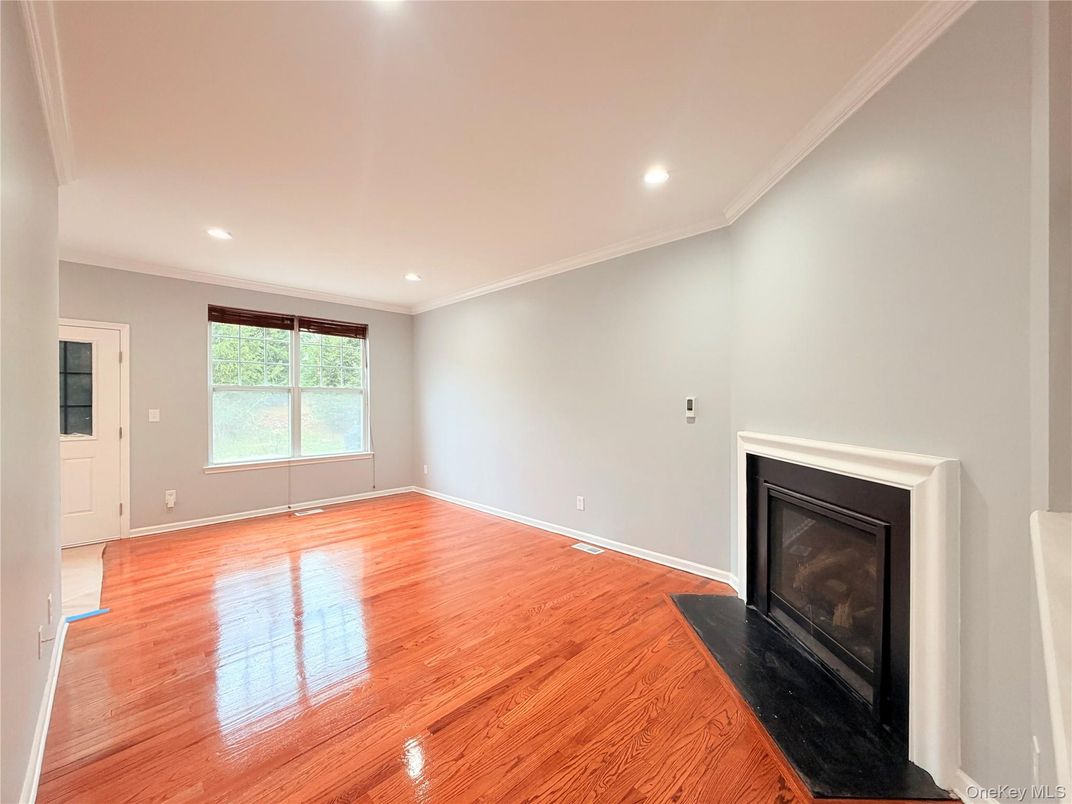 Empty room, Fireplace, Interior, Recessed Lighting, Wood Texture Flooring