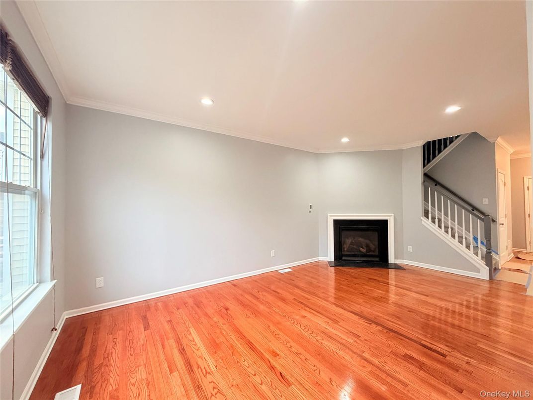 Empty room, Fireplace, Interior, Recessed Lighting, Wood Texture Flooring
