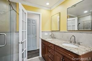 Bathroom, Dual Sink Vanities, Glass Shower, Interior, Recessed Lighting, Wood Texture Flooring