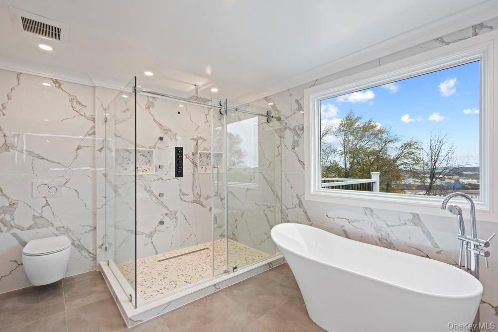 Bathroom, Free Standing Baths, Glass Shower, Interior, Marble Walls, Recessed Lighting