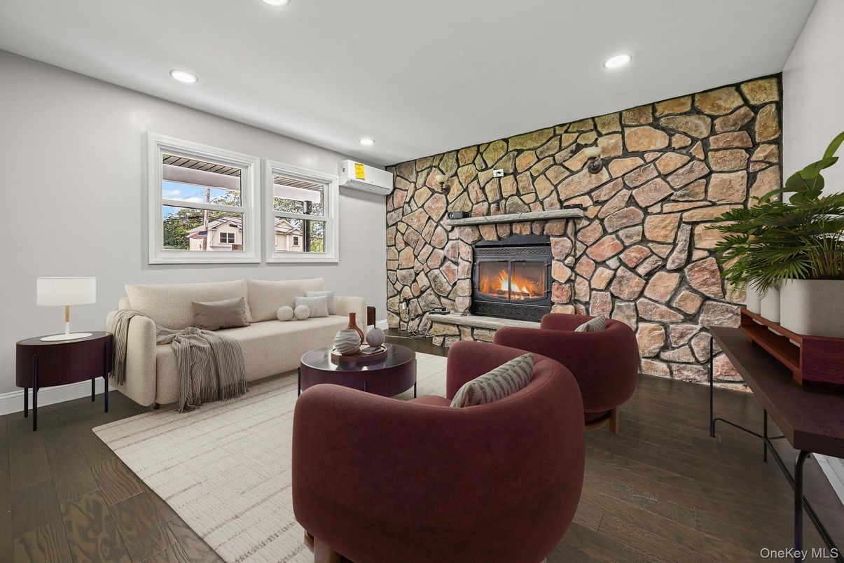 Fireplace, Interior, Living room, Recessed Lighting, Stone Walls, Wood Texture Flooring