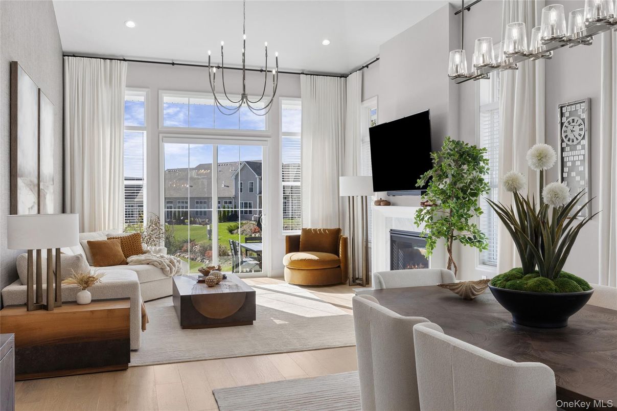 Dining room, Fireplace, Interior, Living room, Pendant Lights, Recessed Lighting, Wood Texture Flooring