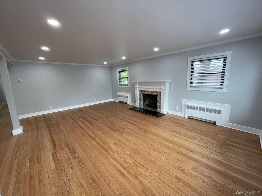 Empty room, Fireplace, Interior, Recessed Lighting, Wood Texture Flooring