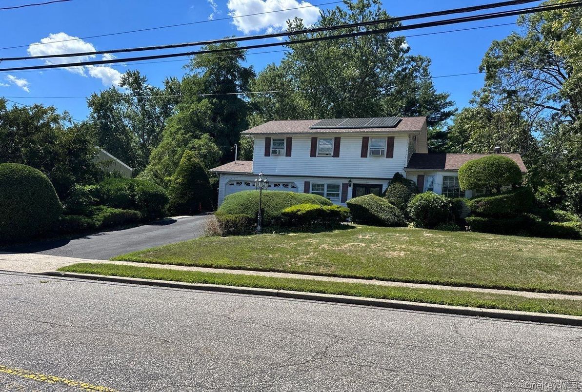 Attached, Exterior, Facade, Solar Panels, Split Level