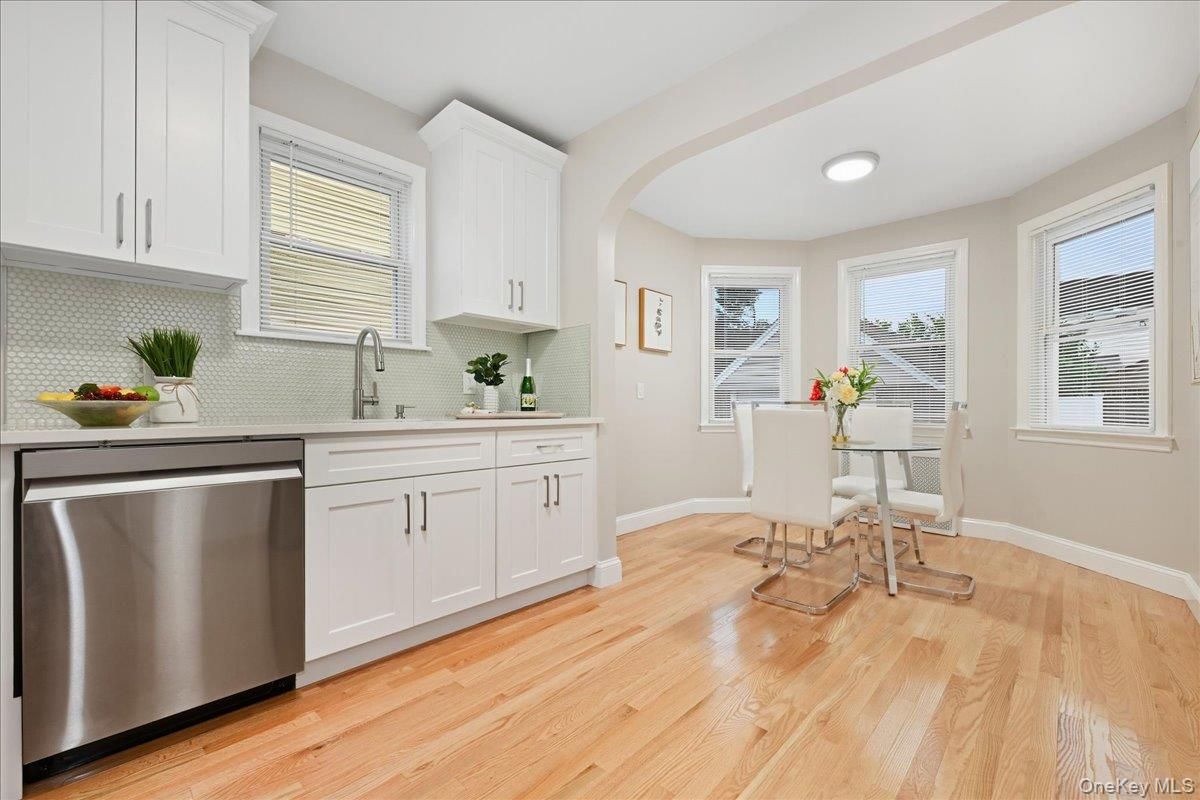 Dining room, Interior, Kitchen, Recessed Lighting, Stainless Steel Appliances, Wood Texture Flooring